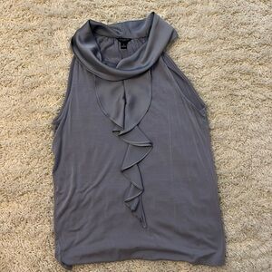 Ice blue sleeveless top with front ruffle detail from Ann Taylor. Size S.
